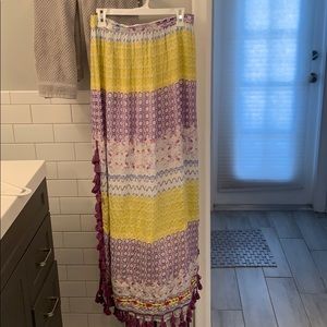 Bohemian style long skirt with tassels.